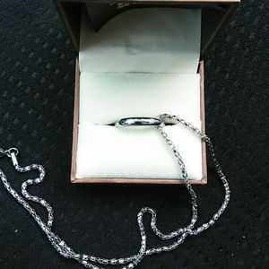 Lord of The Ring with elvish writing. Silver tone.